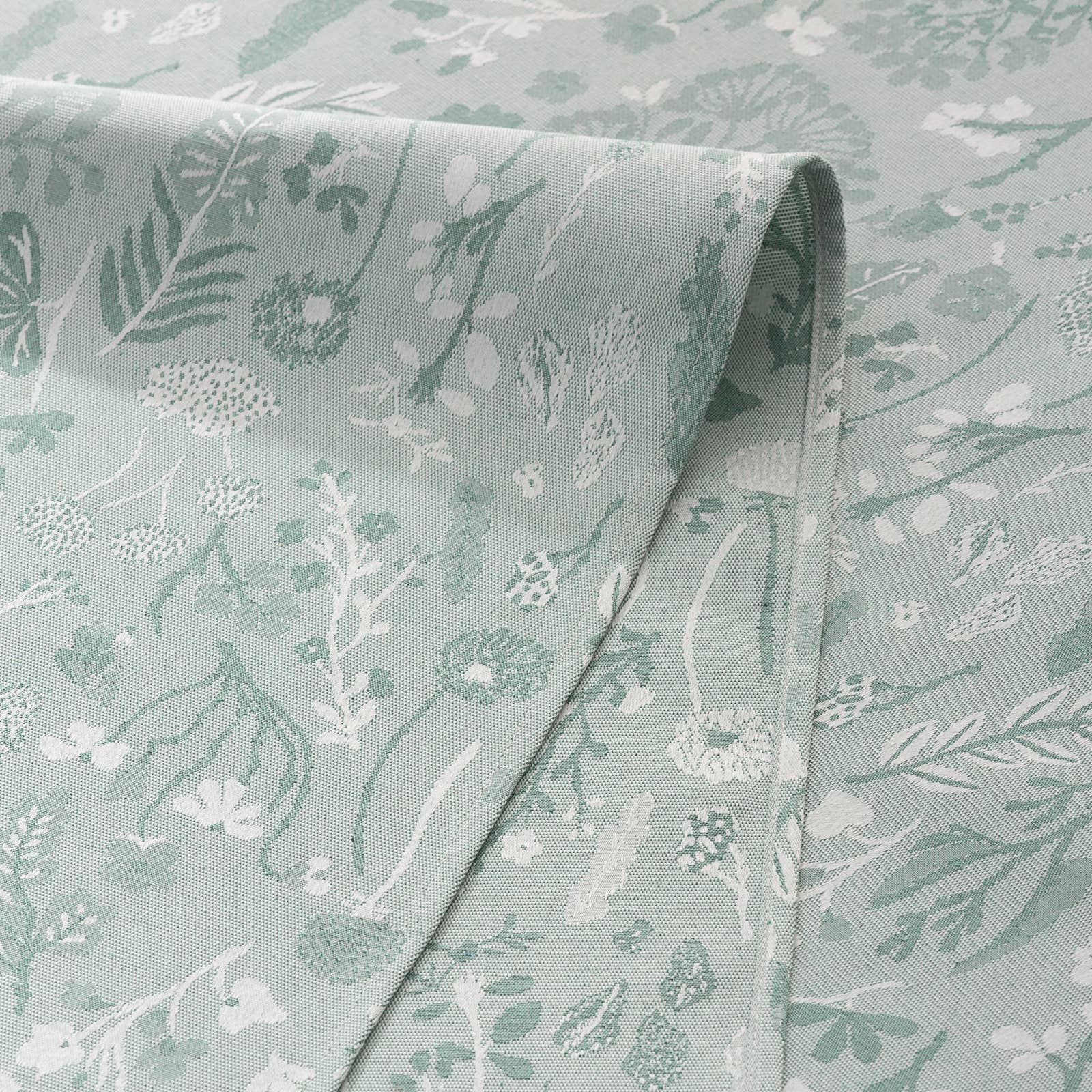 Mantel impermeable jacquard floral ALERCE 🌿✨
